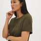 Green faux suede crew neck top with short sleeves by Suzy.