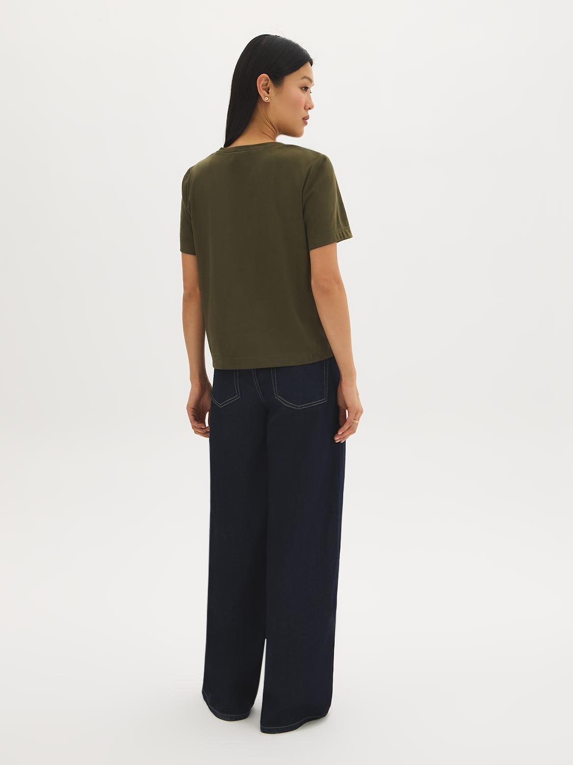 Green faux suede crew neck top with short sleeves by Suzy.