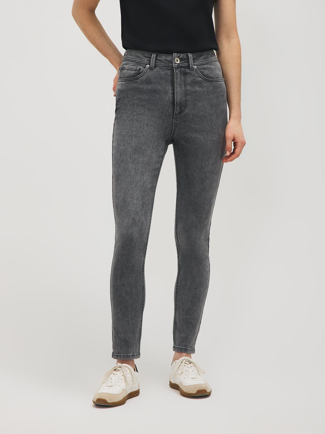 Jean en mélange de coton à jambe ajustée et taille haute