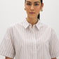 Winter White Striped Drop Shoulder Blouse - Woman Wearing Button-Front Stripe Shirt - Suzy Shier