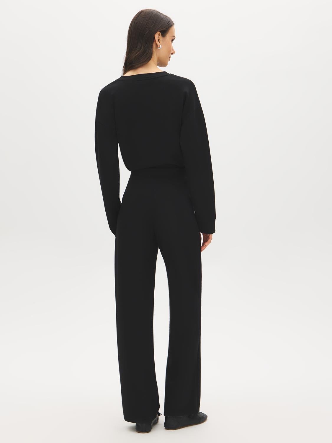 Black Cloud Fleece Wide-Leg Pant - Woman Wearing Relaxed Fit Knit Pants - Suzy Shier