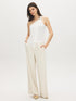 Snow White Asymmetrical One-Shoulder Knit Top - Woman Wearing Sleek Sleeveless Top - Suzy Shier