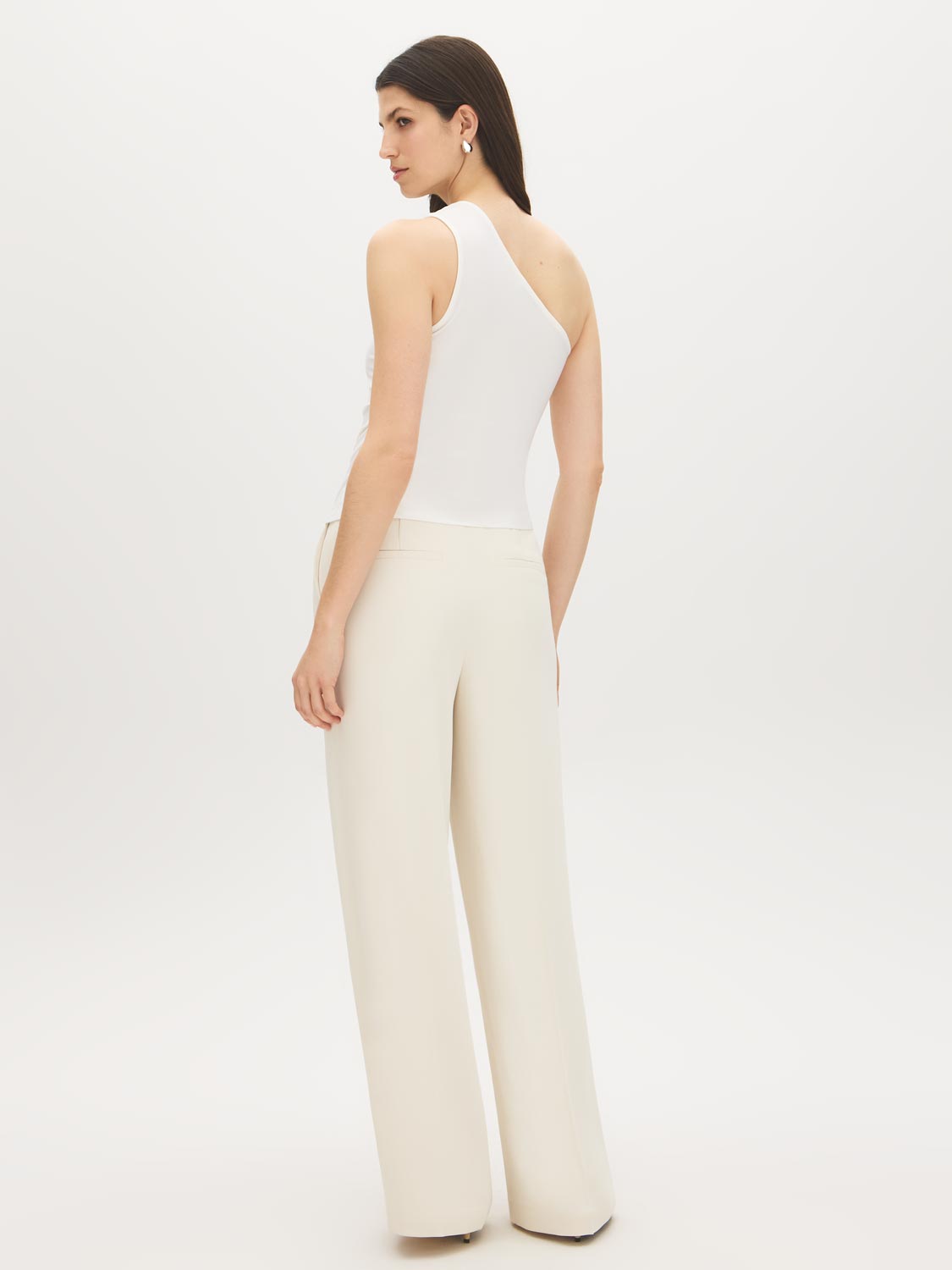 Snow White Asymmetrical One-Shoulder Knit Top - Woman Wearing Sleek Sleeveless Top - Suzy Shier