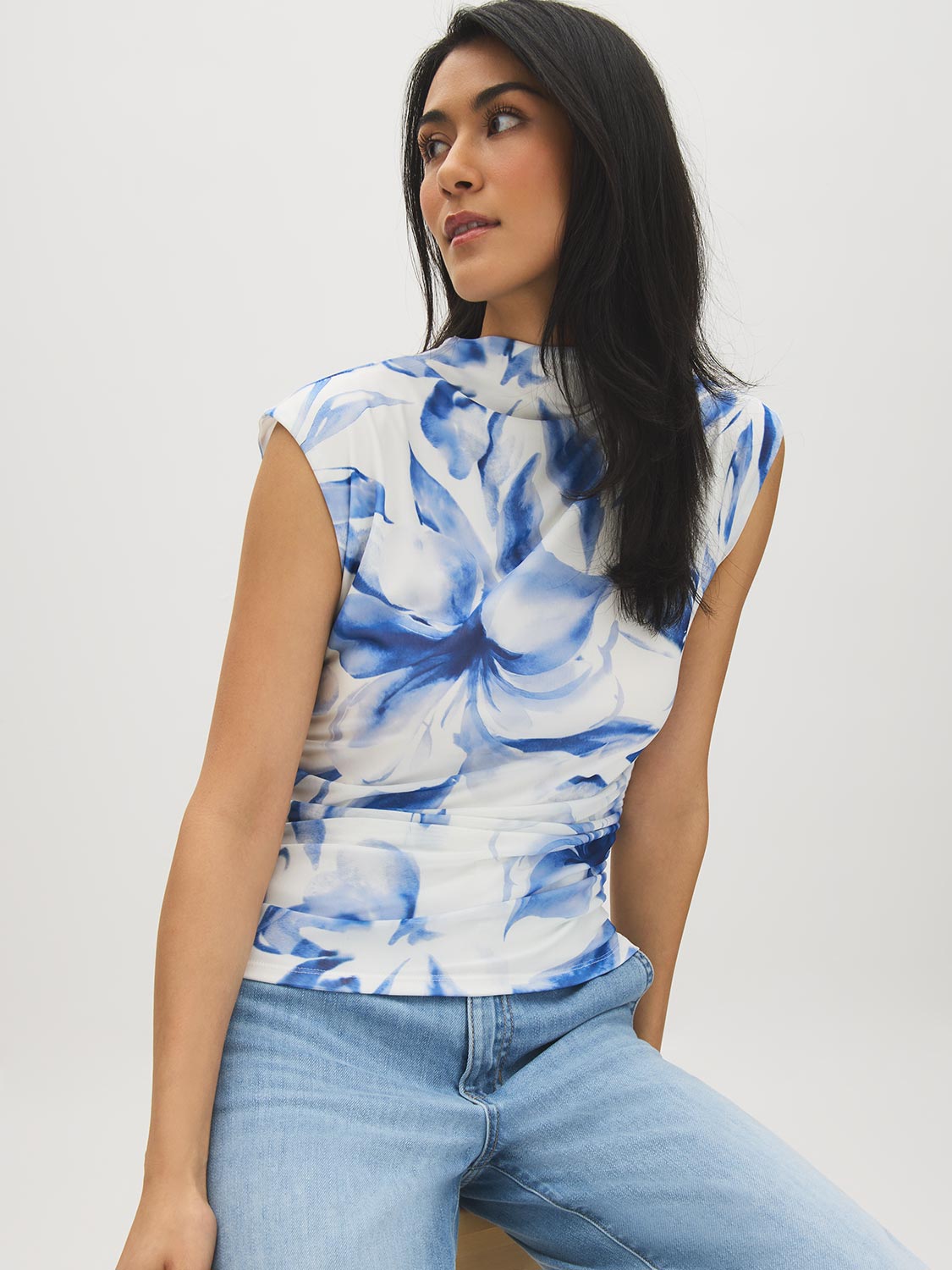 Snow White Printed Mesh Mock Neck Top - Woman Wearing Sleeveless Mesh Top with Ruching - Suzy Shier