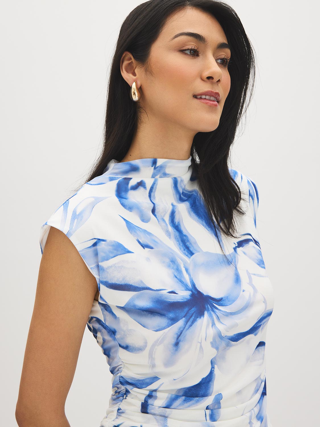 Snow White Printed Mesh Mock Neck Top - Woman Wearing Sleeveless Mesh Top with Ruching - Suzy Shier