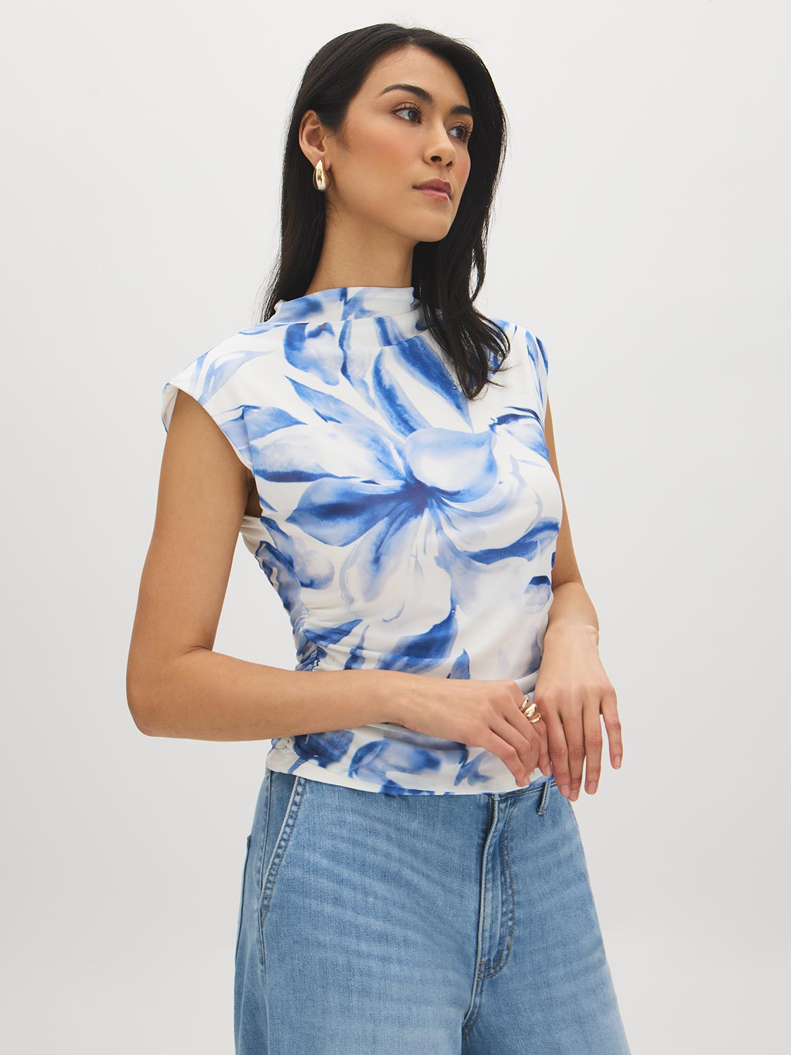 Snow White Printed Mesh Mock Neck Top - Woman Wearing Sleeveless Mesh Top with Ruching - Suzy Shier