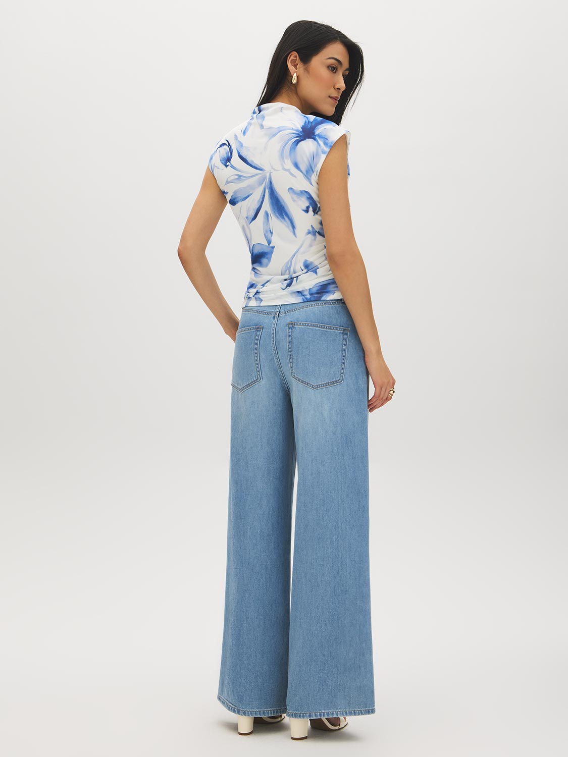Snow White Printed Mesh Mock Neck Top - Woman Wearing Sleeveless Mesh Top with Ruching - Suzy Shier