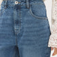 Medium Wash Rhinestone Straight Leg Denim Pant - Close-up Fabric Detail - Suzy Shier