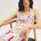 Snow White Conversational Print Halter Mini Dress - Woman Wearing Printed Linen Blend Dress - Suzy Shier