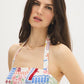 Snow White Conversational Print Halter Mini Dress - Woman Wearing Printed Linen Blend Dress - Suzy Shier