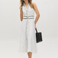 Snow White/Black Dot Print Midi Shirt Dress - Woman Wearing Sleeveless Dress with Sash - Suzy Shier