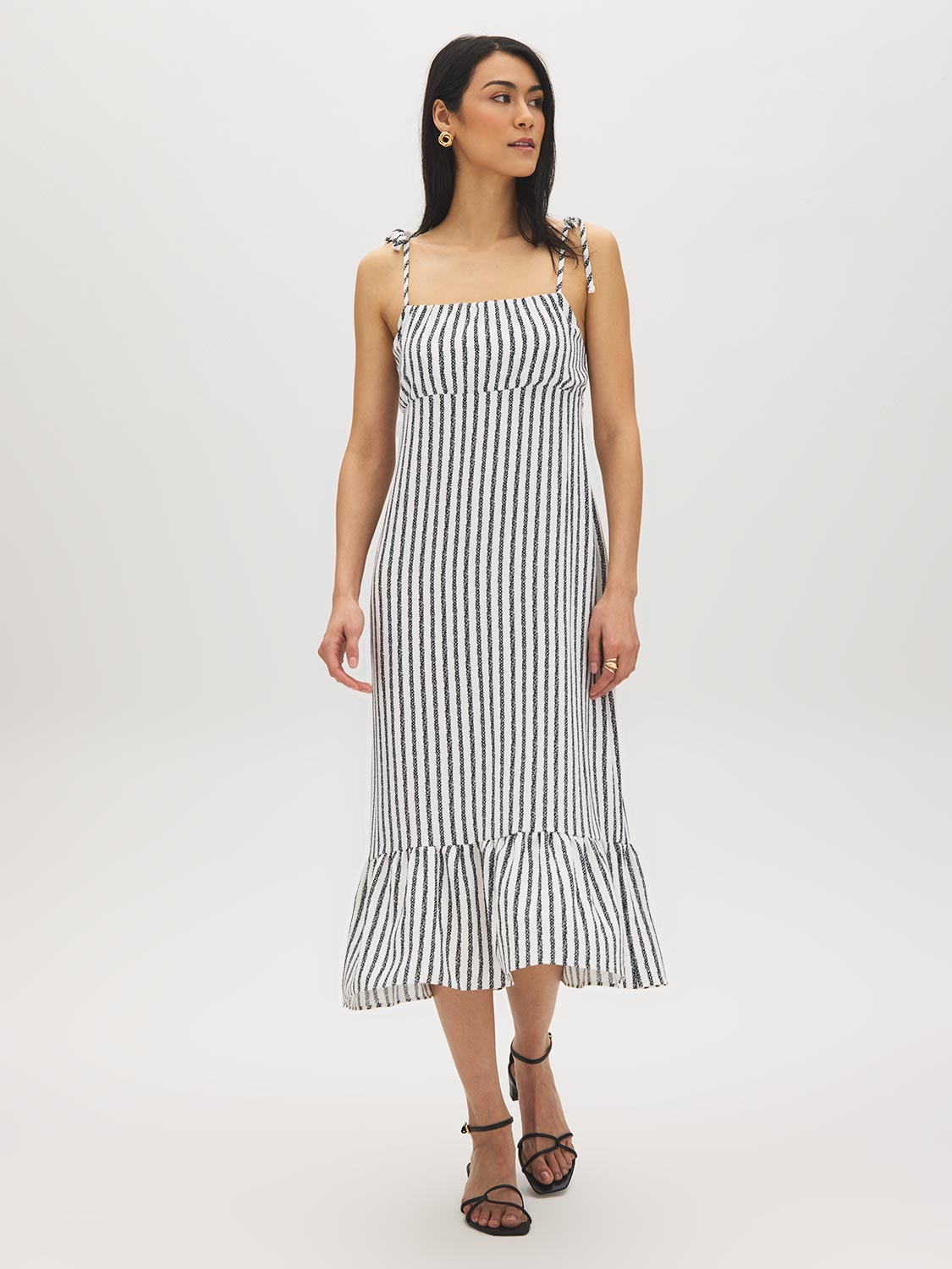 Snow White Black Stripe Empire Waist Midi Dress - Woman Wearing Striped Dress with Ruffle Hem - Suzy Shier