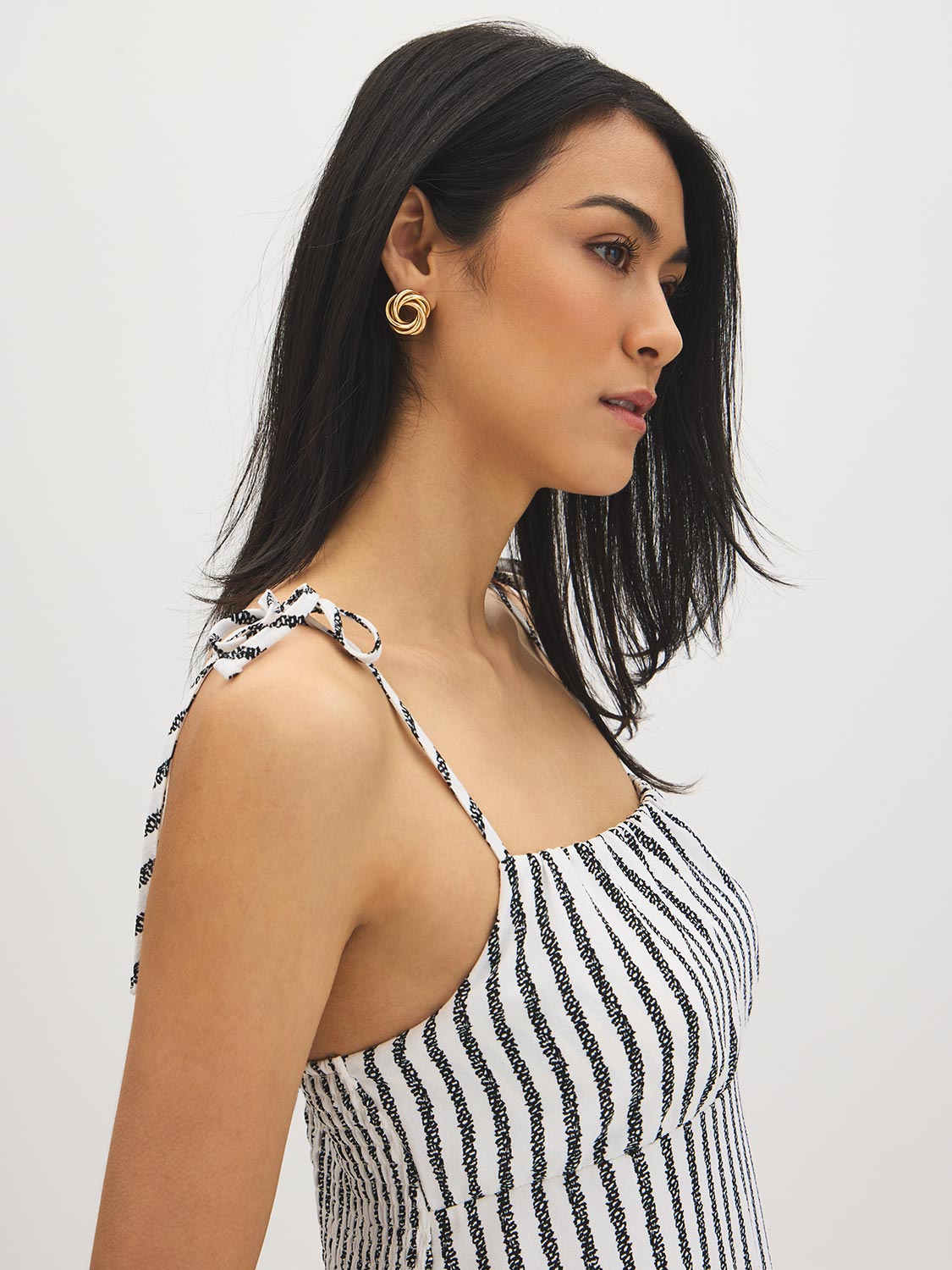 Snow White Black Stripe Empire Waist Midi Dress - Woman Wearing Striped Dress with Ruffle Hem - Suzy Shier