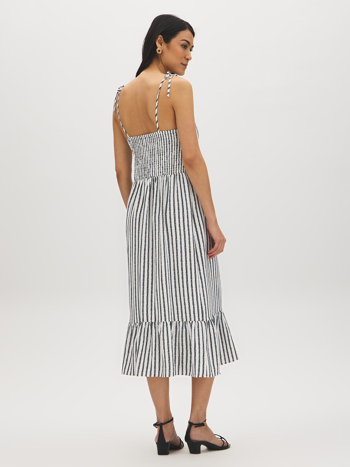 Snow White Black Stripe Empire Waist Midi Dress - Woman Wearing Striped Dress with Ruffle Hem - Suzy Shier