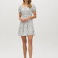 Snow White Ditsy Print Mini Dress - Woman Wearing Off-the-Shoulder Tiered Dress - Suzy Shier