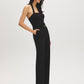 Black Halter Neck Knit Jumpsuit - Woman Wearing Elegant One-Piece with Self-Belt - Suzy Shier