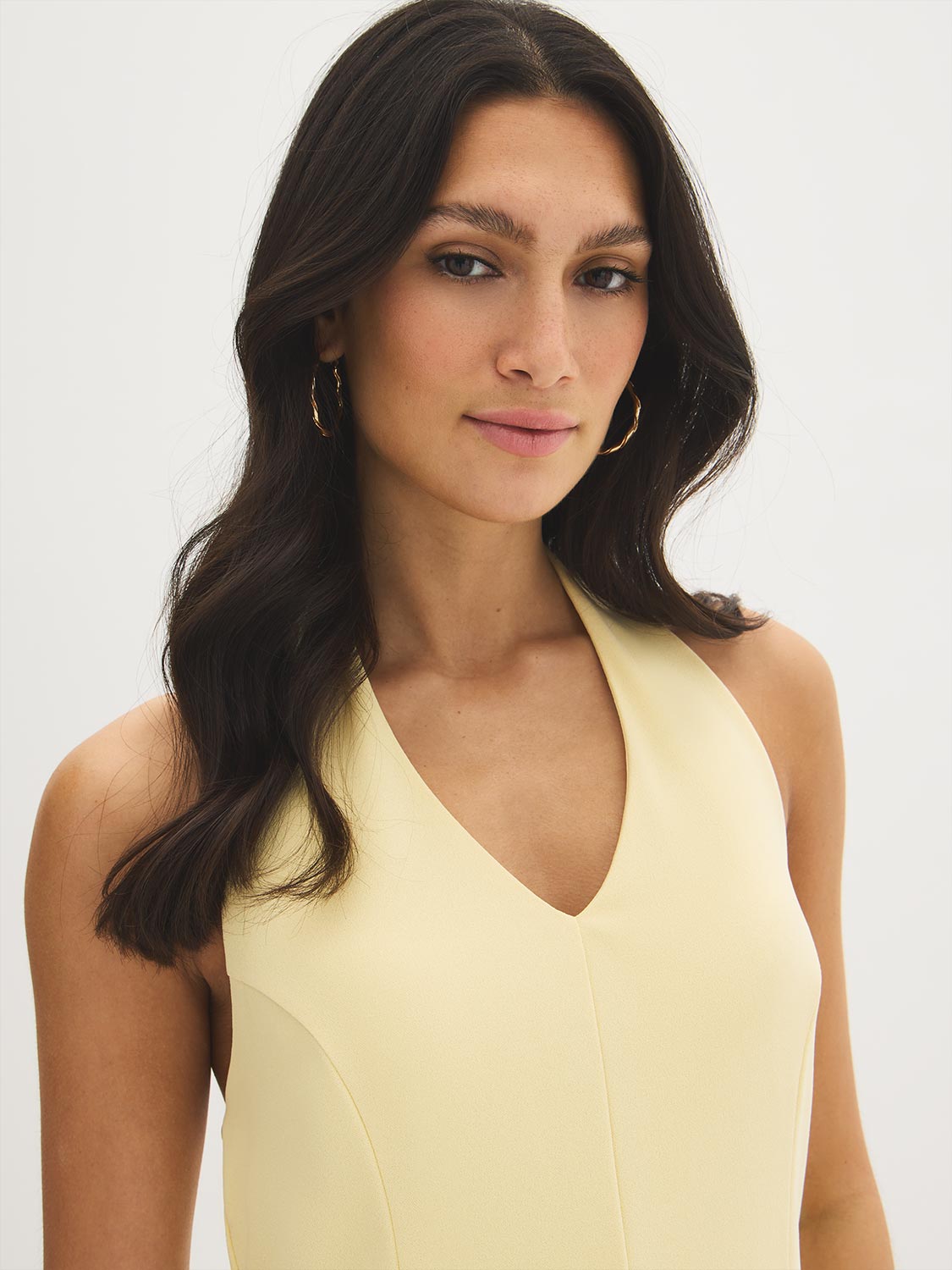 Banana Crepe Solid Mini Halter Dress - Woman Wearing V-Front Halter Dress - Suzy Shier