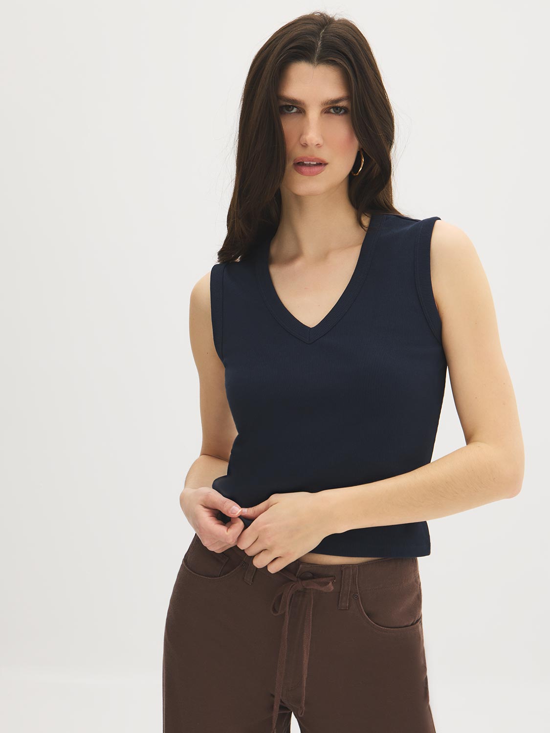 White Sleeveless Rib Jersey V-Neck Tank Top - Woman Wearing Fitted V-Neck Tank - Suzy Shier