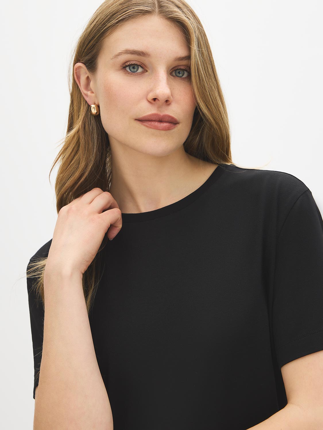 Jet Black Relaxed Fit Jersey T-Shirt with Side Slits - Woman Wearing Soft Crew Neck Top - Suzy Shier