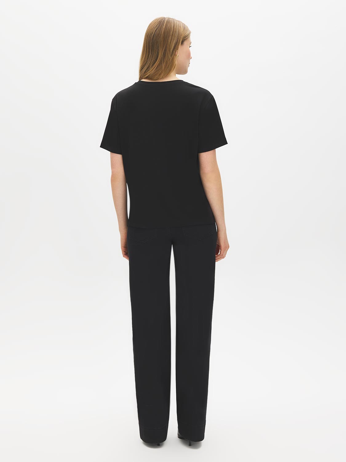 Jet Black Relaxed Fit Jersey T-Shirt with Side Slits - Woman Wearing Soft Crew Neck Top - Suzy Shier