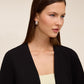 Knit crepe bolero with 3/4 sleeves and open-front design by Le Chateau.