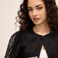 Embroidered Floral Bolero by Le Chateau.