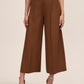 Cinnamon pleated culotte pants in fine by Le Chateau.