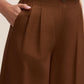 Cinnamon pleated culotte pants in fine by Le Chateau.
