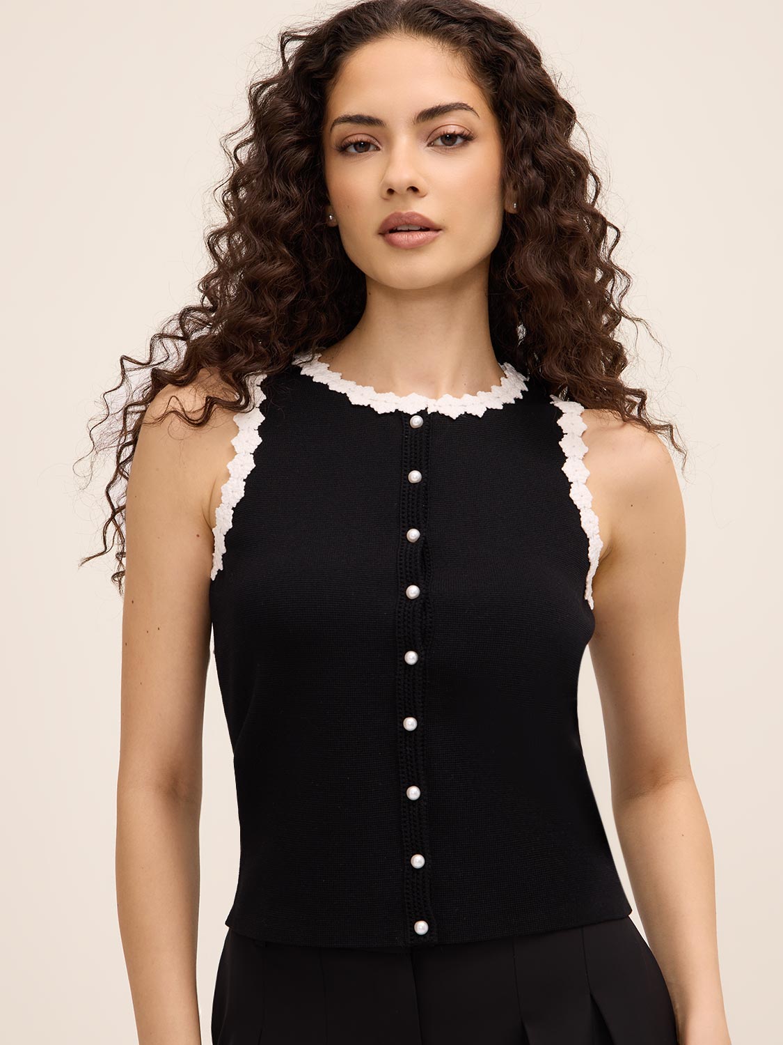 Button-Up Sweater Vest by Le Chateau.