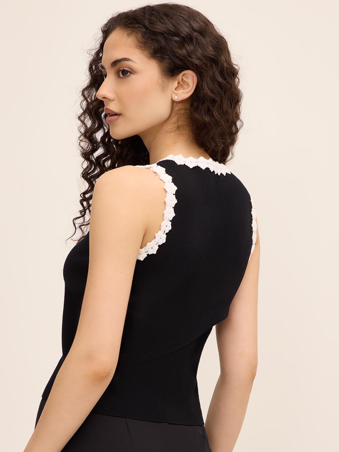 Button-Up Sweater Vest by Le Chateau.