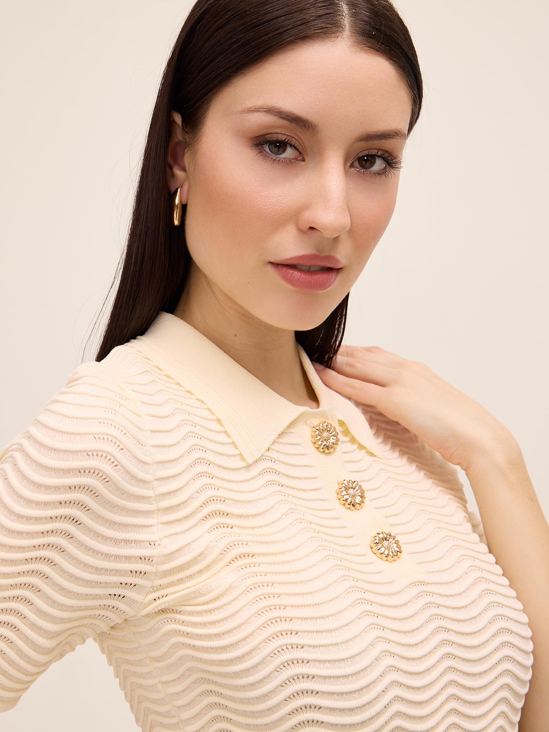 Wavy Ribbed Polo by Le Chateau.