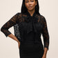 Black Lace Bolero with 3/4 Sleeves and Bow Ties - Woman Wearing Elegant Cover-Up - Le Chateau