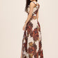 Antique Cream/Rust Printed Chiffon Crossover Neckline Gown - Woman Wearing Full-Length Ruffle Dress - Le Chateau