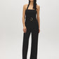 Black Halter Neck Knit Jumpsuit - Woman Wearing Elegant One-Piece with Self-Belt - Suzy Shier