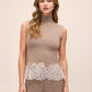 Oatmeal Lace Trim Mock Neck Sleeveless Sweater - Woman Wearing Knit Top with Delicate Neckline Detail - Le Chateau