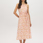 Peach Dust Floral Print Halter Midi Dress - Woman Wearing Fit-and-Flare Chiffon Dress - Suzy Shier