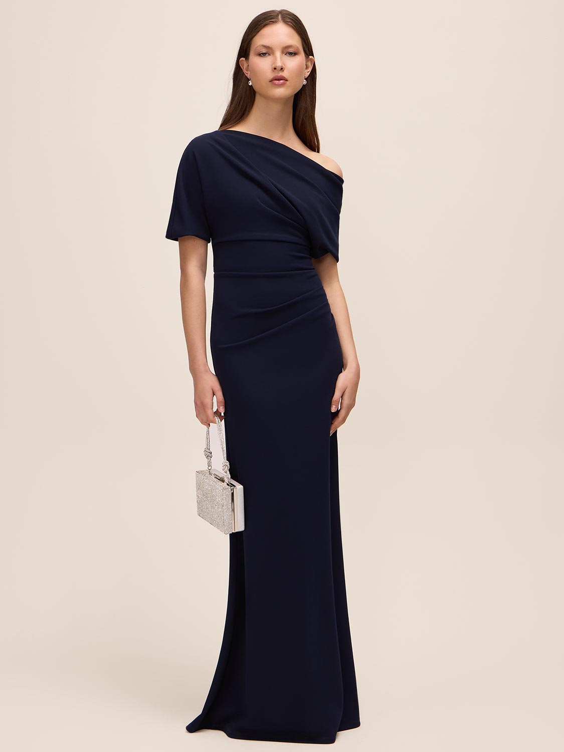 Dark Sapphire Knit Crepe Gown with Asymmetrical Neckline - Woman Wearing Evening Dress with Pleat Detail - Le Chateau