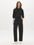 Black Barrel Leg Cloud Fleece Pants - Woman Wearing Comfortable Knit Trousers - Suzy Shier