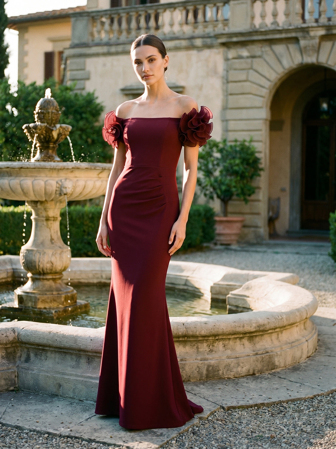 Bordeaux Off-Shoulder Knit Crepe Gown with Chiffon Rosette Sleeves - Woman Wearing Elegant Evening Dress - Le Chateau