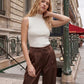 Snow White Sleeveless Rib Knit Sweater - Close-up Neck Detail - Suzy Shier