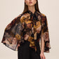 Dijon Print Floral Tie Neck Cape Top - Side Profile View - Le Chateau