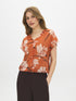 Autumn Leaf Printed V-Neck Blouse with Dolman Sleeves - Woman Wearing Relaxed Fit Blouse - Suzy Shier