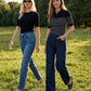 Black/Pearl Striped Ribbed Polo Sweater - Woman Wearing Buttoned Polo Knit Top - Suzy Shier