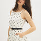 Snow White Polka Dot Flowy Midi Dress - Woman Wearing Spaghetti Strap Dress with Belt - Suzy Shier