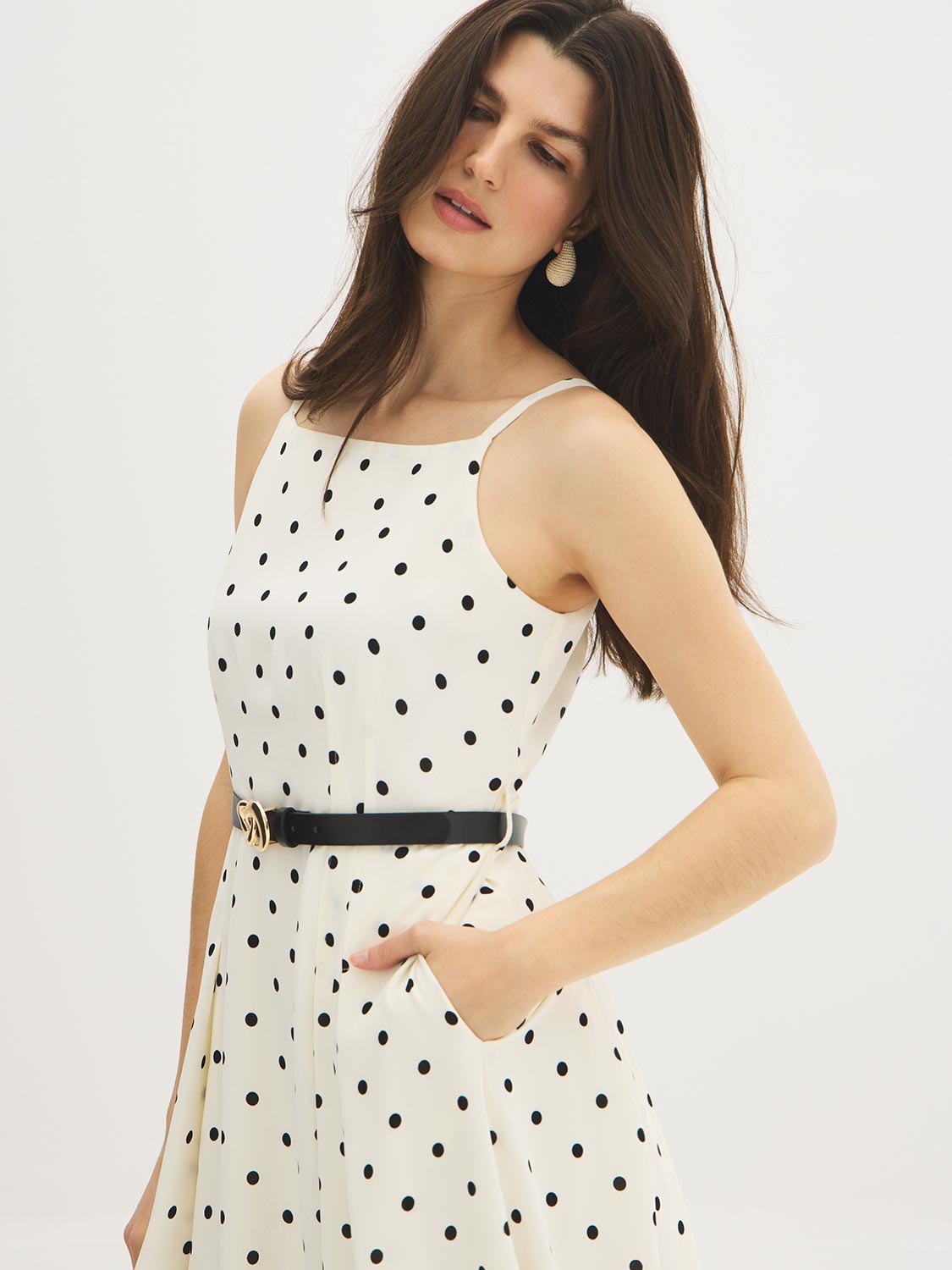 Snow White Polka Dot Flowy Midi Dress - Woman Wearing Spaghetti Strap Dress with Belt - Suzy Shier