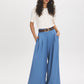Light Denim Blue Wide-Leg Pull-On Pant with Belt - Woman Wearing Relaxed Fit Trousers - Suzy Shier