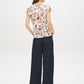 Snow White Floral Knit Top with Ruffle Sleeves - Back View - Suzy Shier