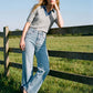 Grey Melange Puff Sleeve Jacquard Sweater - Woman Wearing Knit Top with Denim Collar - Suzy Shier