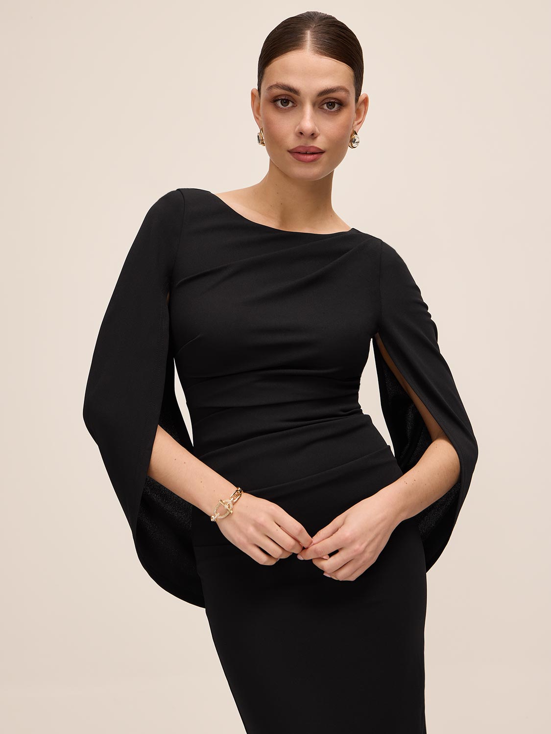 Black Boat Neck Sheath Dress with Back Cape - Close-up Front Detail - Le Chateau