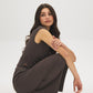 Charcoal Textured Asymmetrical Dolman Sleeve Top - Seated View - Suzy Shier